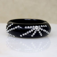 Black Celluloid Clamper Bracelet with Sparkling Fireworks