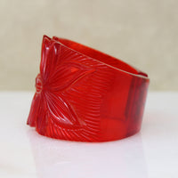 Polynesian Motif Red Bakelite Clamper Bracelet