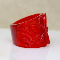 Polynesian Motif Red Bakelite Clamper Bracelet