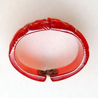 Polynesian Motif Red Bakelite Clamper Bracelet