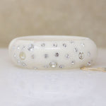 White Celluloid & Rhinestone Clamper Bracelet by Weiss