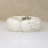 White Celluloid & Rhinestone Clamper Bracelet by Weiss