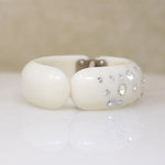 White Celluloid & Rhinestone Clamper Bracelet by Weiss