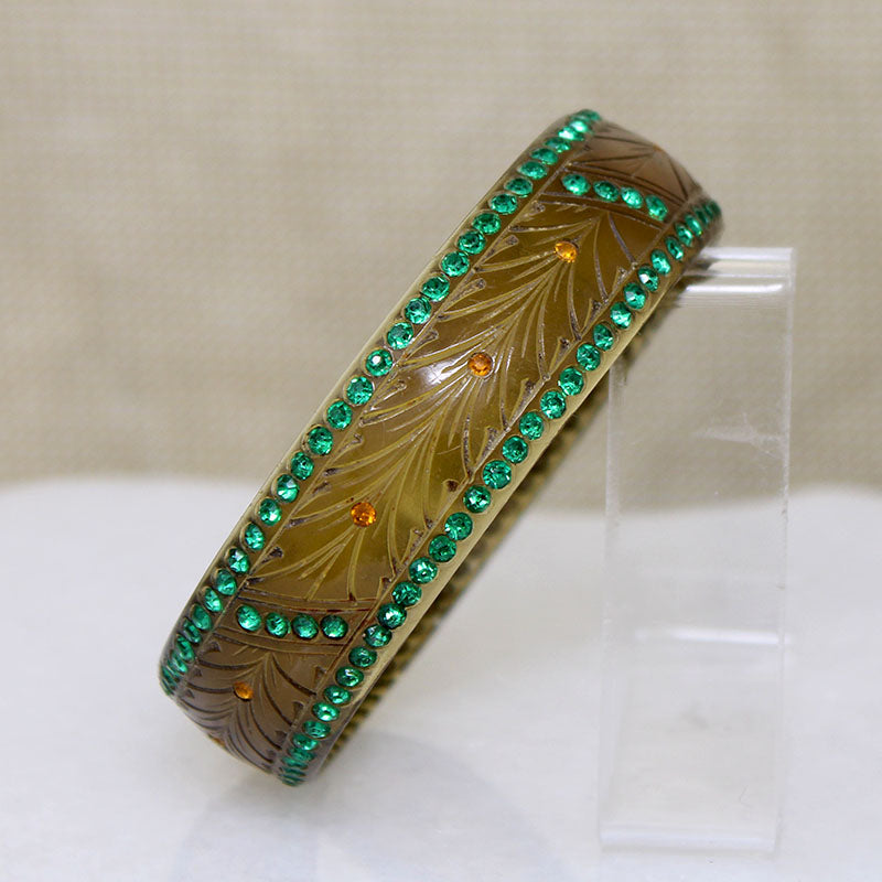 Carved Celluloid Bangle with Green & Orange Stones
