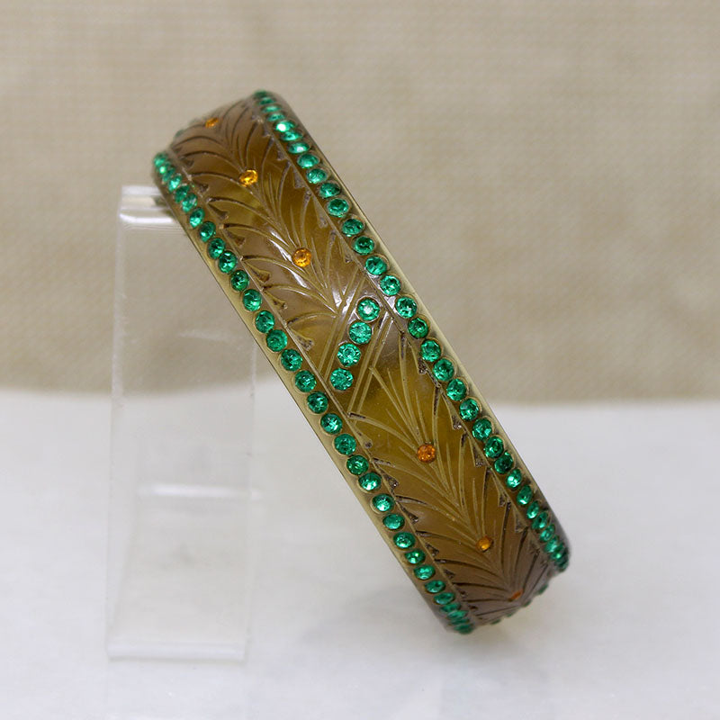 Carved Celluloid Bangle with Green & Orange Stones