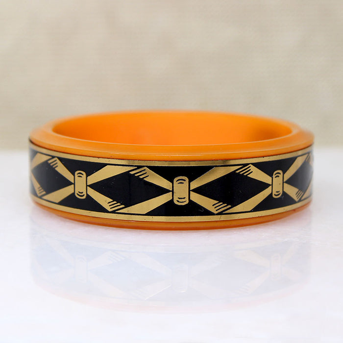 Racy Orange Bakelite Cosmetic Bracelet