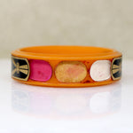 Racy Orange Bakelite Cosmetic Bracelet