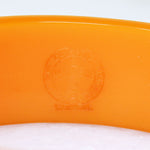 Racy Orange Bakelite Cosmetic Bracelet