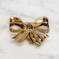 Festive Sterling Silver & Rhinestone Ciner Bow Brooch