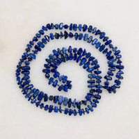 Lapis Lazuli Nugget Beads on Blue Silk