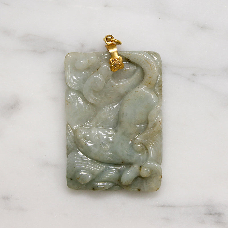 Prowling Lion Carved Jade Pendant