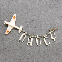 Nancy's Sweetheart WWII Celluloid Army Plane Brooch