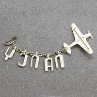 Nancy's Sweetheart WWII Celluloid Army Plane Brooch