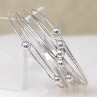 Sophisticated & Kinetic Sterling Silver Bracelet
