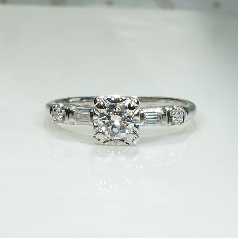 Sophisticated Diamond Ring with Baguette & Round Accents