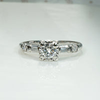 Sophisticated Diamond Ring with Baguette & Round Accents