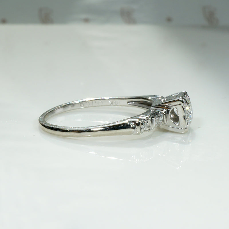 Sophisticated Diamond Ring with Baguette & Round Accents