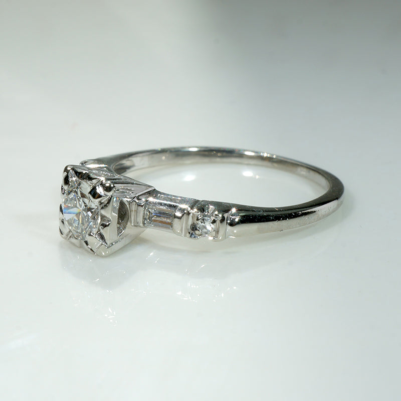 Sophisticated Diamond Ring with Baguette & Round Accents