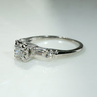 Sophisticated Diamond Ring with Baguette & Round Accents