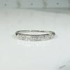 Seven Diamonds in Sculpted & Engraved Platinum Band