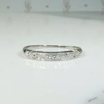 Seven Diamonds in Sculpted & Engraved Platinum Band
