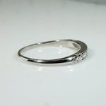 Seven Diamonds in Sculpted & Engraved Platinum Band
