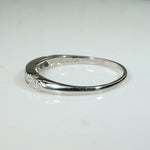 Seven Diamonds in Sculpted & Engraved Platinum Band