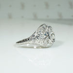 Delicious Diamond-Spangled Platinum Filigree Dome Ring