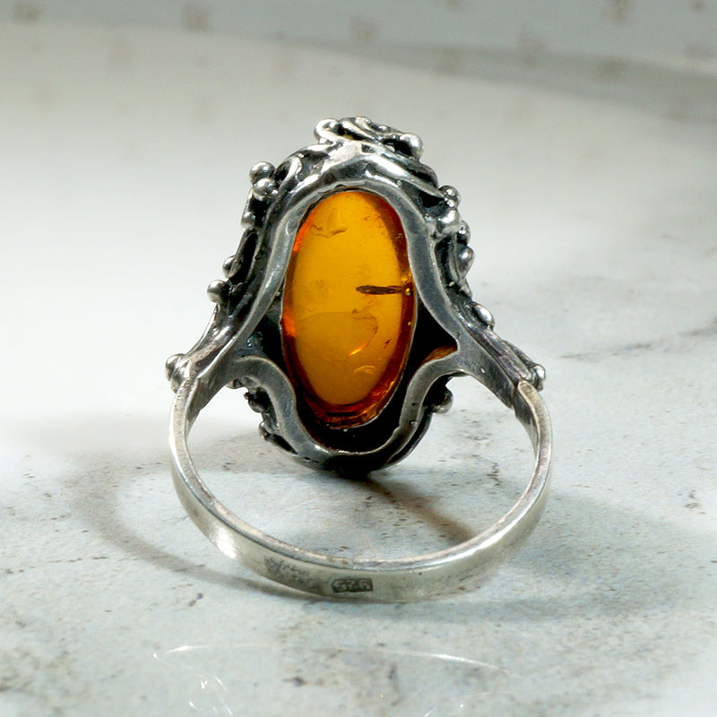 Golden Amber in Undulating Silver Ring