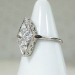 Keen Lozenge-Shaped Diamond Cluster Ring