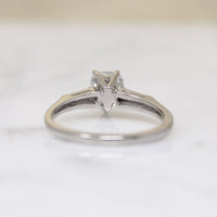 Pear Cut Diamond with Baguettes in White Gold Ring