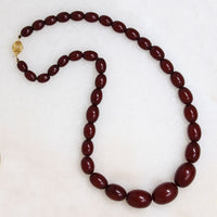 Polished Oval Red Amber Bead Necklace