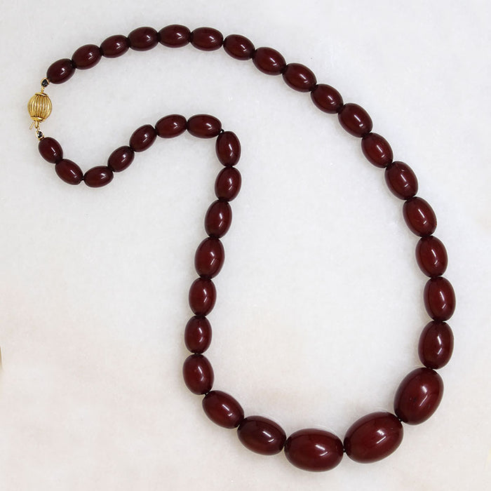 Polished Oval Red Amber Bead Necklace