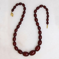 Polished Oval Red Amber Bead Necklace
