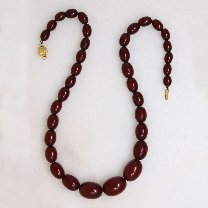 Polished Oval Red Amber Bead Necklace