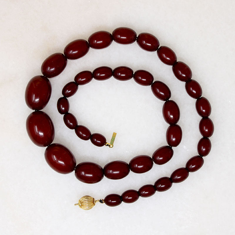 Polished Oval Red Amber Bead Necklace
