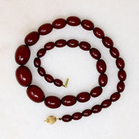 Polished Oval Red Amber Bead Necklace