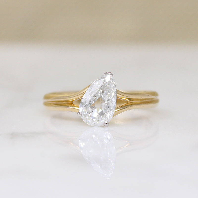 Bright White & Sparkling Pear Cut Diamond Solitaire Ring
