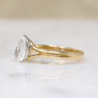 Bright White & Sparkling Pear Cut Diamond Solitaire Ring