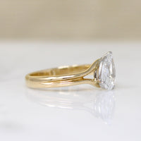 Bright White & Sparkling Pear Cut Diamond Solitaire Ring