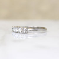Sparkling Five Diamond & Platinum Wedding Band