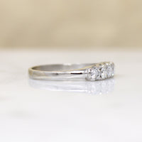Sparkling Five Diamond & Platinum Wedding Band