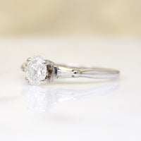 Classic Mid Century Engagement Ring with Oval Diamond