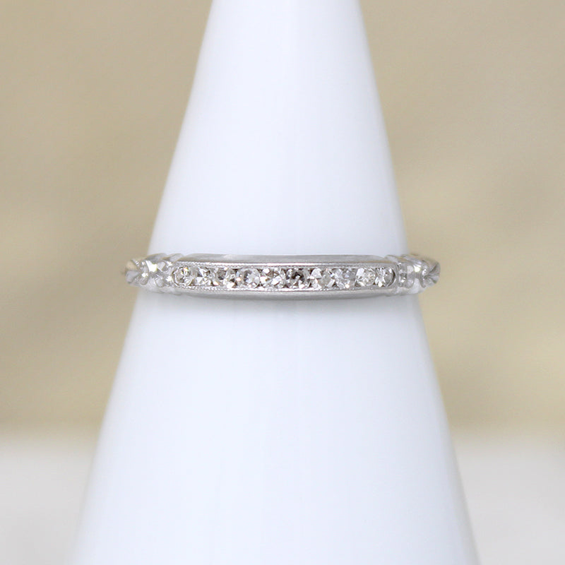 Sparkly Diamonds in Exquisitely Modeled Platinum Band