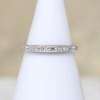 Sparkly Diamonds in Exquisitely Modeled Platinum Band