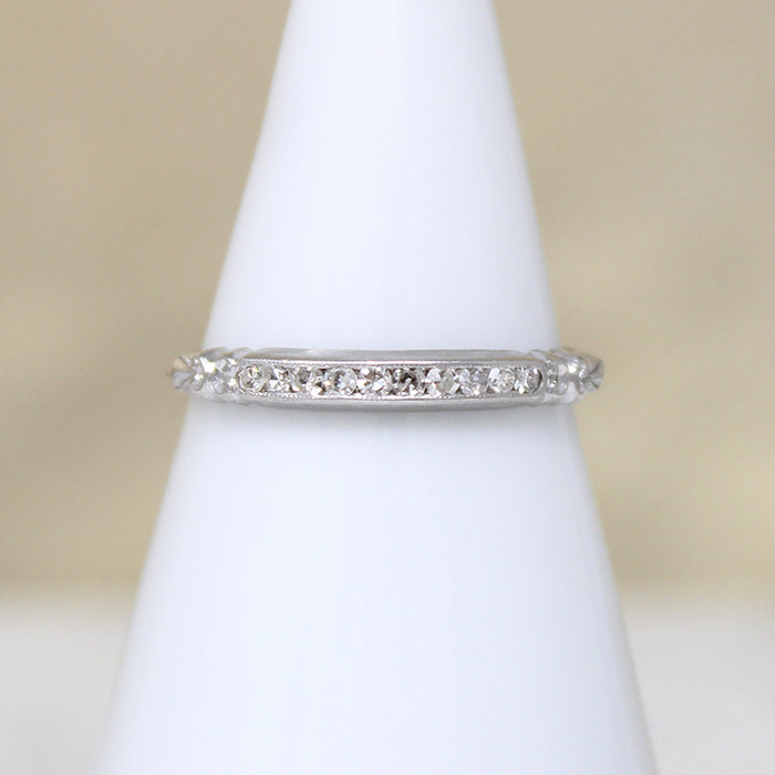 Sparkly Diamonds in Exquisitely Modeled Platinum Band