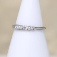 Sparkly Diamonds in Exquisitely Modeled Platinum Band