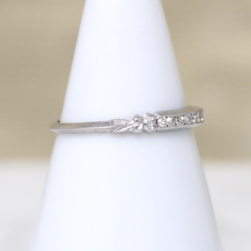 Sparkly Diamonds in Exquisitely Modeled Platinum Band