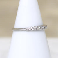 Sparkly Diamonds in Exquisitely Modeled Platinum Band