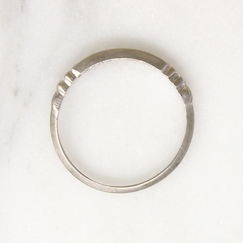 Sparkly Diamonds in Exquisitely Modeled Platinum Band